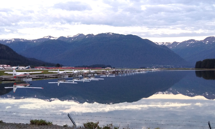 VIEW OF JUNEAU AIRPORT WATER SIDE FILLED WITH FLOATPLANES