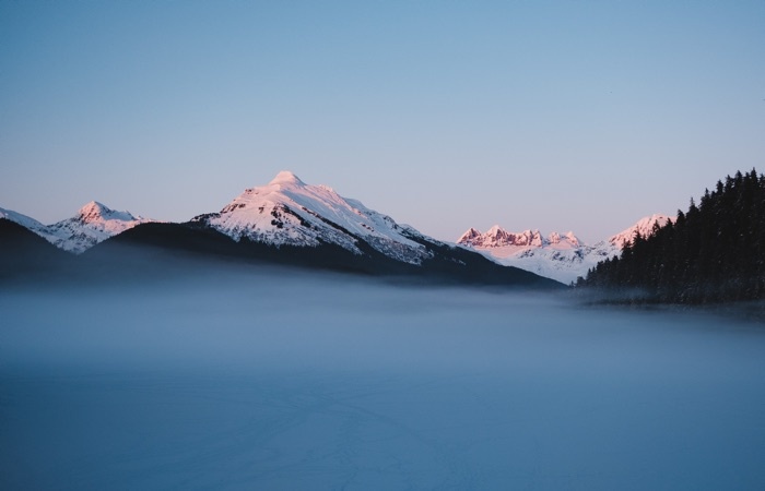 fog blanketing over auke lake juneau alaska