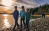 stephen walking the shoreline with his family