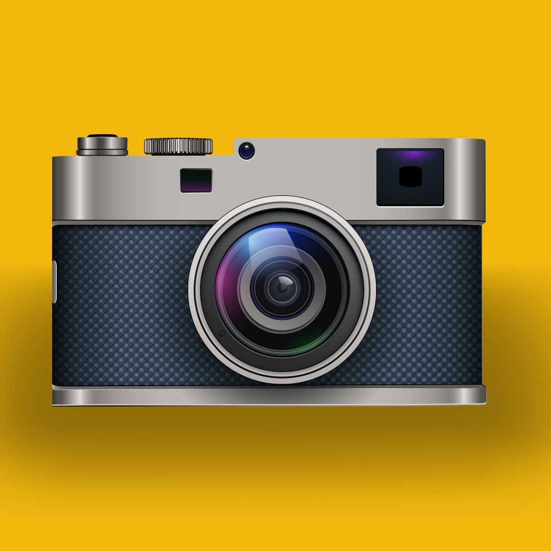 retro camera with gold background